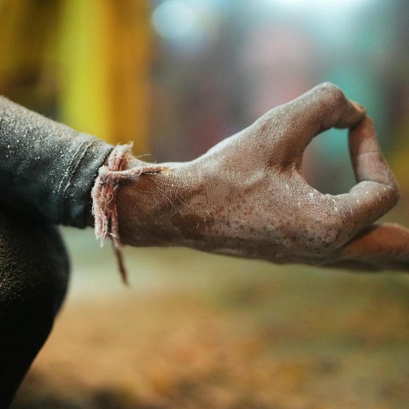 Close up of hands in a meditative yoga mudra
